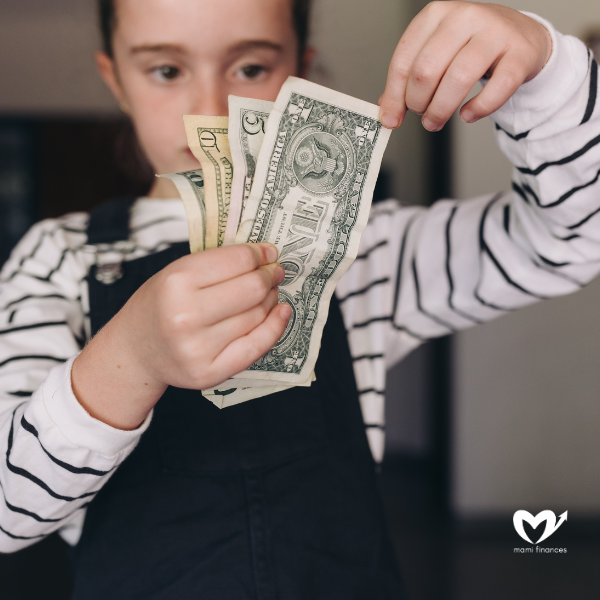 Child Counting the Money