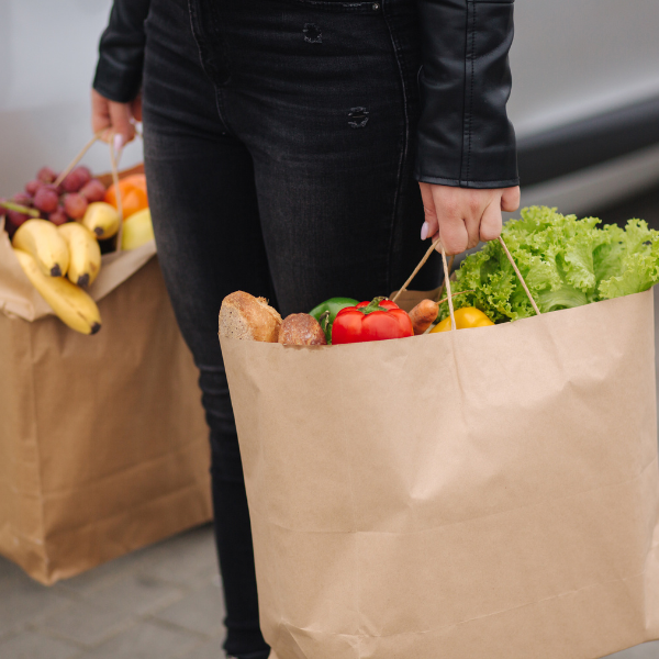 Woman Holding Bags of Groceries