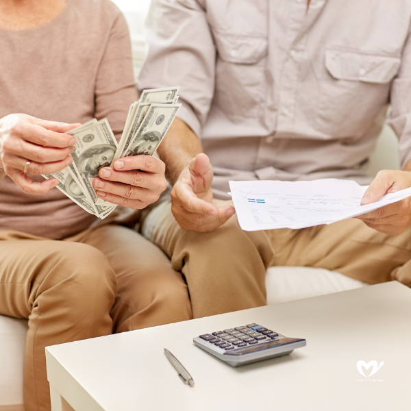 Couple with Money and Calculator