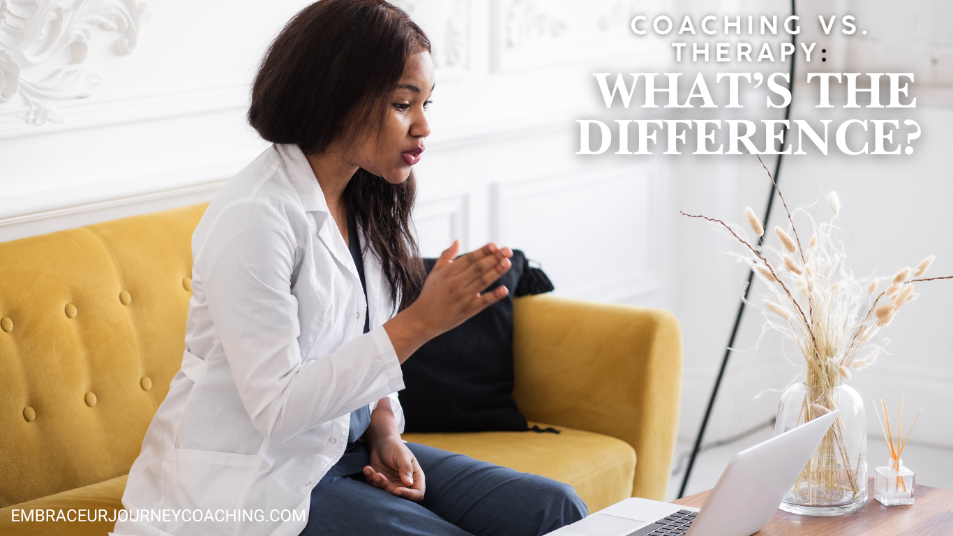 Black woman seated on a mustard-yellow sofa speaking during a virtual session, illustrating the difference between coaching and therapy.